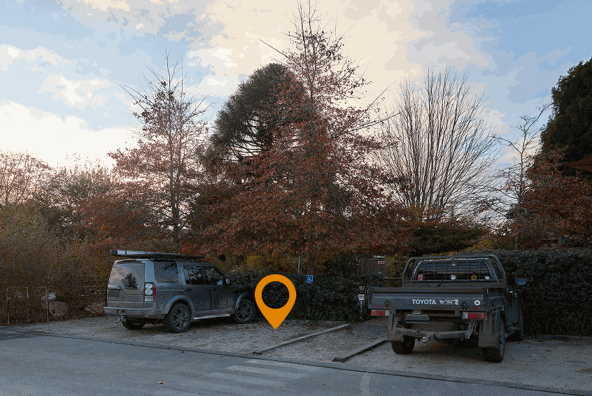 Rear car park with the accessible parking space next to the pathway