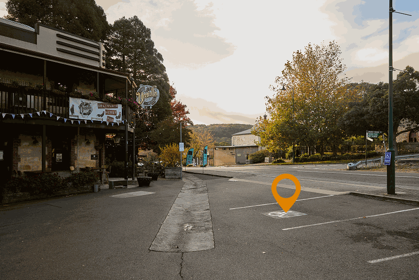 Street view of the Uraidla Hotel front entrance with the accessible parking space marked