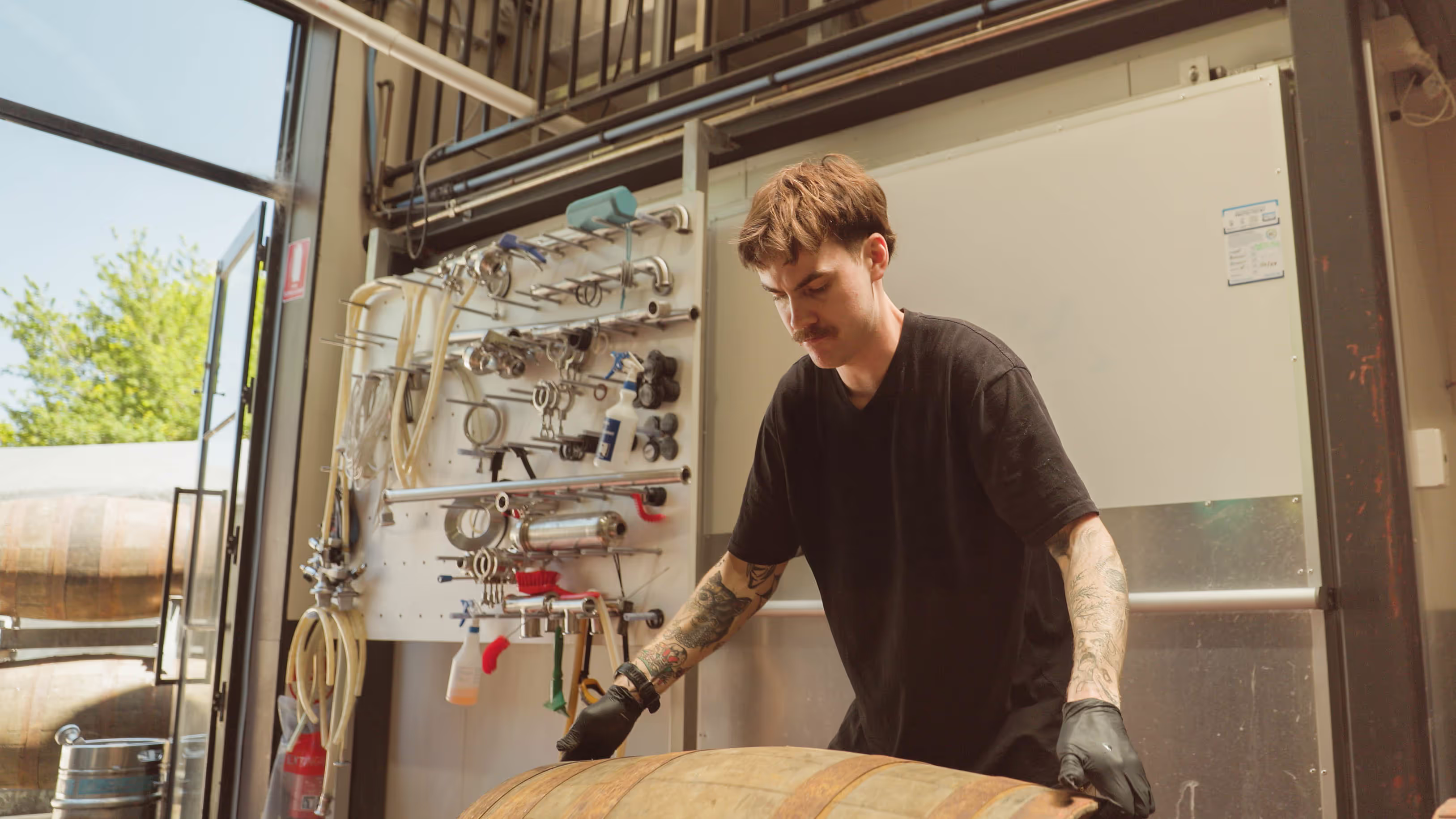 Brewer at work inside Uraidla Brewery